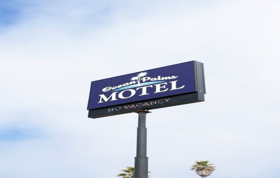 Welcome To The Ocean Palms Motel - Hotel Sign